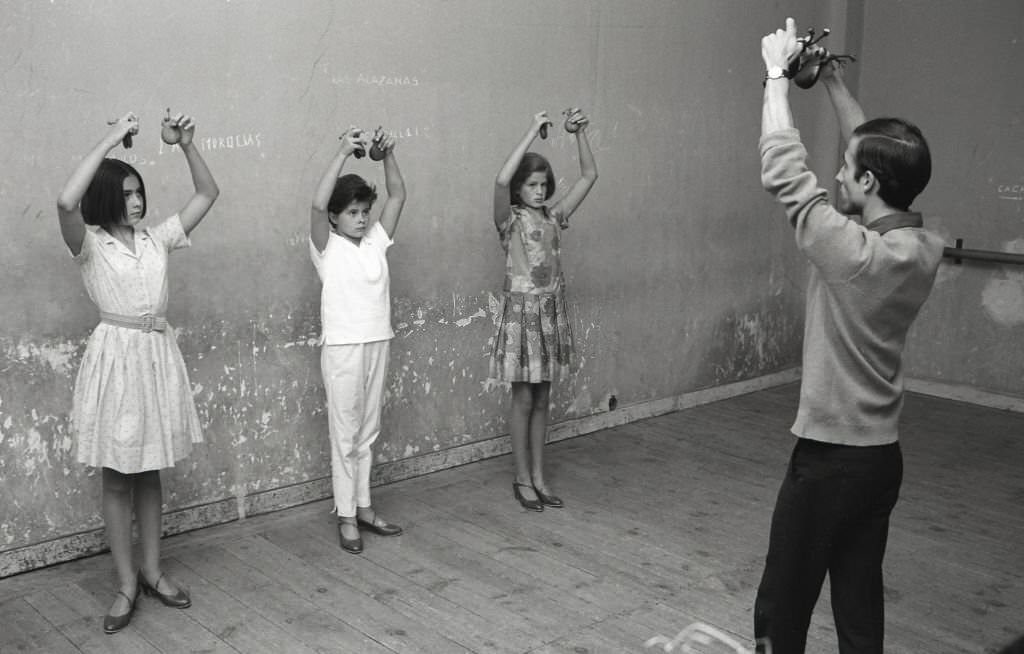 Romina Power and Taryn Power, daughters of Linda Christian during flamenco lessons in Madrid, Spain, 1964.