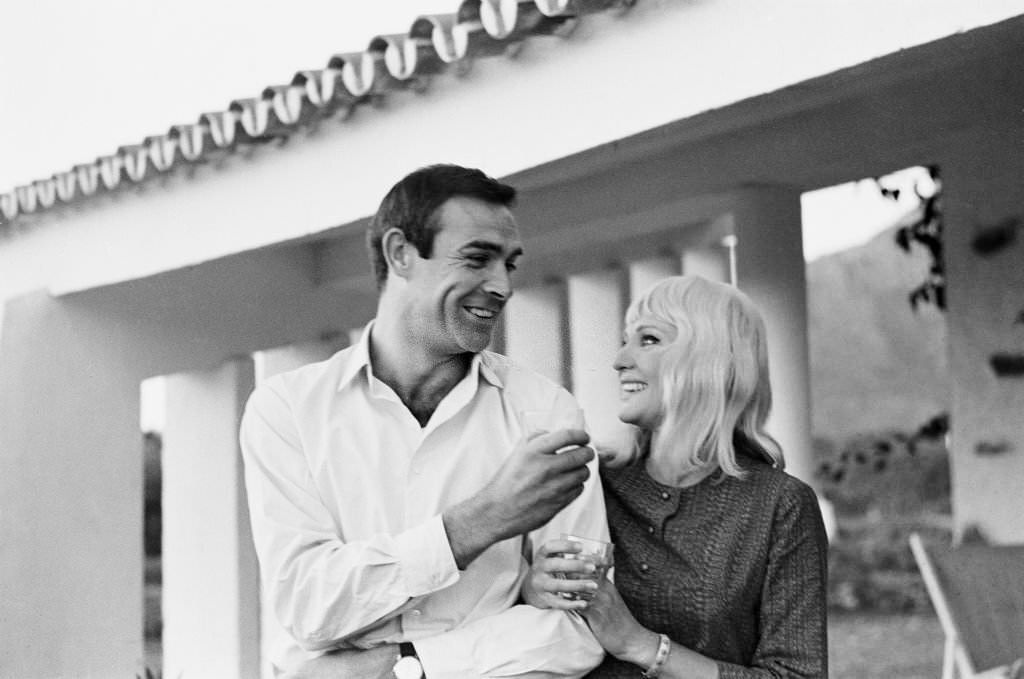 Actor Sean Connery who plays James Bond, actress Diane Cilento on their honeymoon near Marbella in Southern Spain, shortly after their secret wedding in Gibraltar, 1962