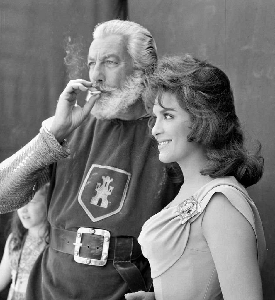 The Mexican actress Teresa Velazquez and the American actor Cesar Romero in the filming of the movie' El Valle de las Espadas', 1962, Madrid, Spain.