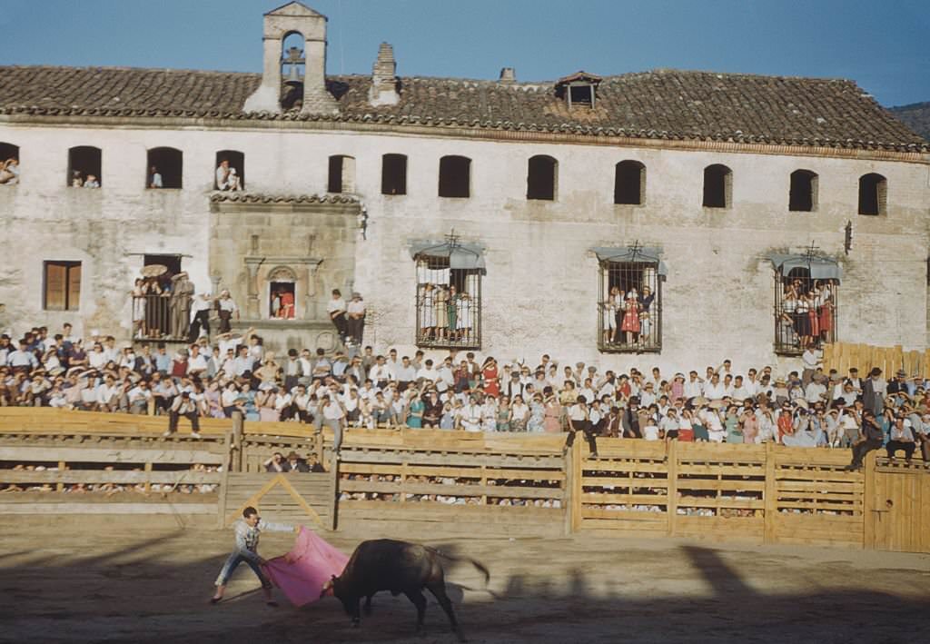 Spectators watching a bullfight in Spain, 960.