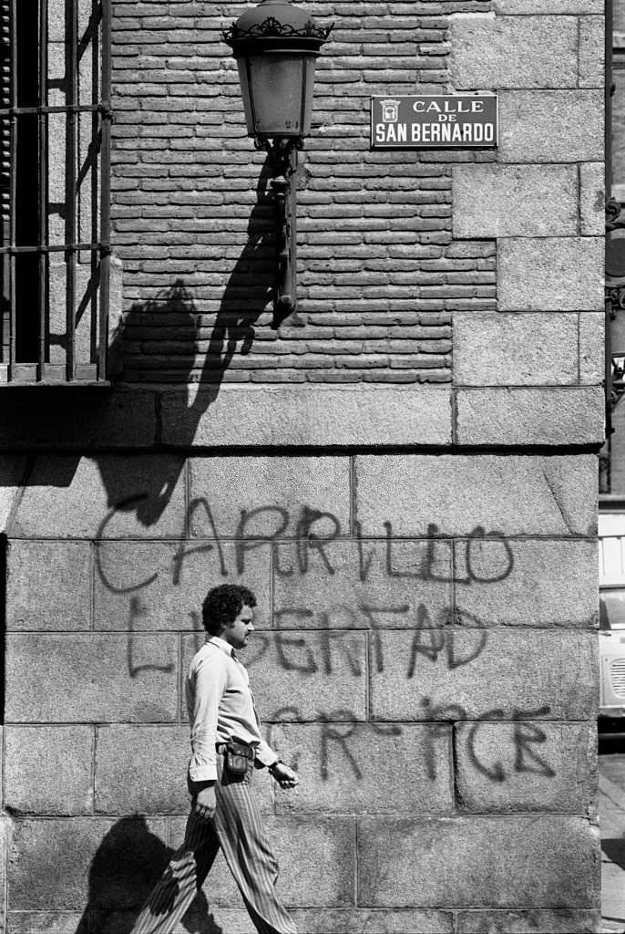 A man walking down San Bernardo Street in Madrid, Spain, August 20, 1977.