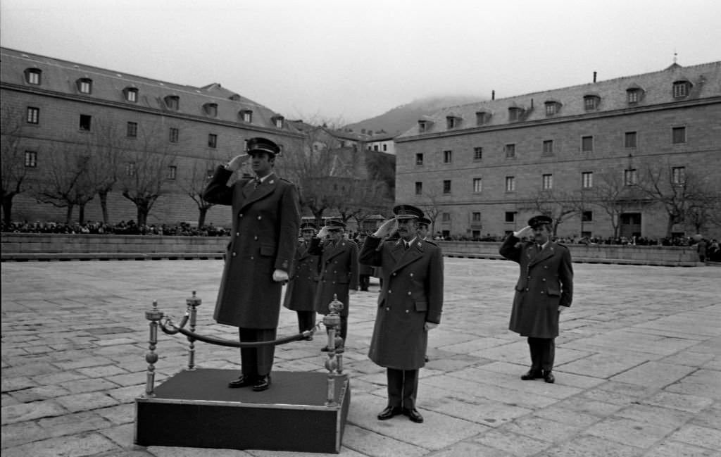 The Kings of Spain, Don Juan Carlos de Borbon and Doña Sofia de Grecia attend the funeral ceremonies for Alfonso XIII in the chapel of San Lorenzo del Escorial, Monastery where the mausoleum of the Royal House is located on February 28, 1976 in Madrid, Spain.