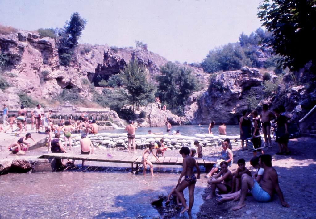 People bathing in the Anoya river, Capellades, Barcelona, 1976.
