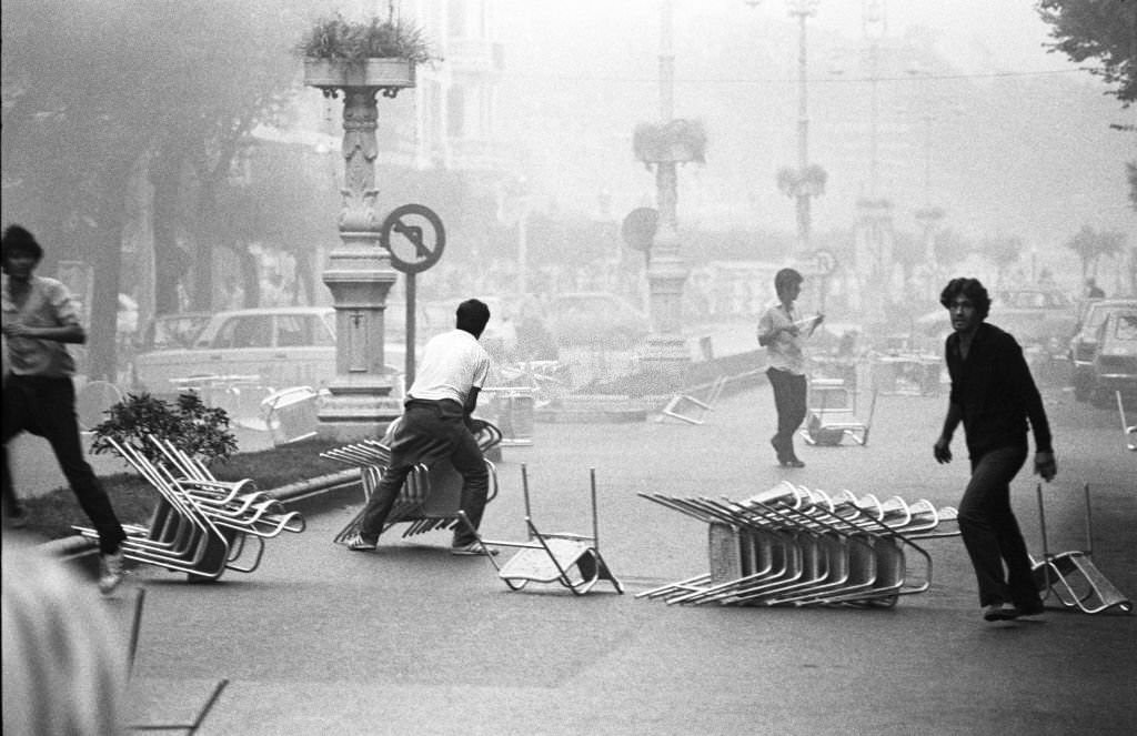 Basque protestors demanding autonomy for the Basque Country attempt to create a street barricade by using cafe tables and chairs in San Sebastian, Spain, 1st September 1979.