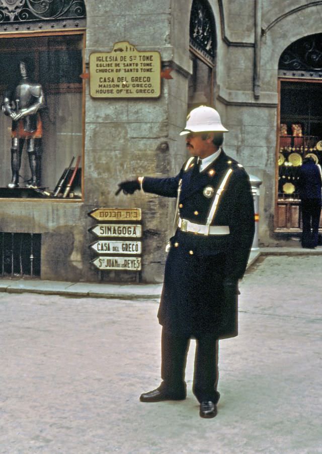 Policeman directing traffic, Toledo, 1977