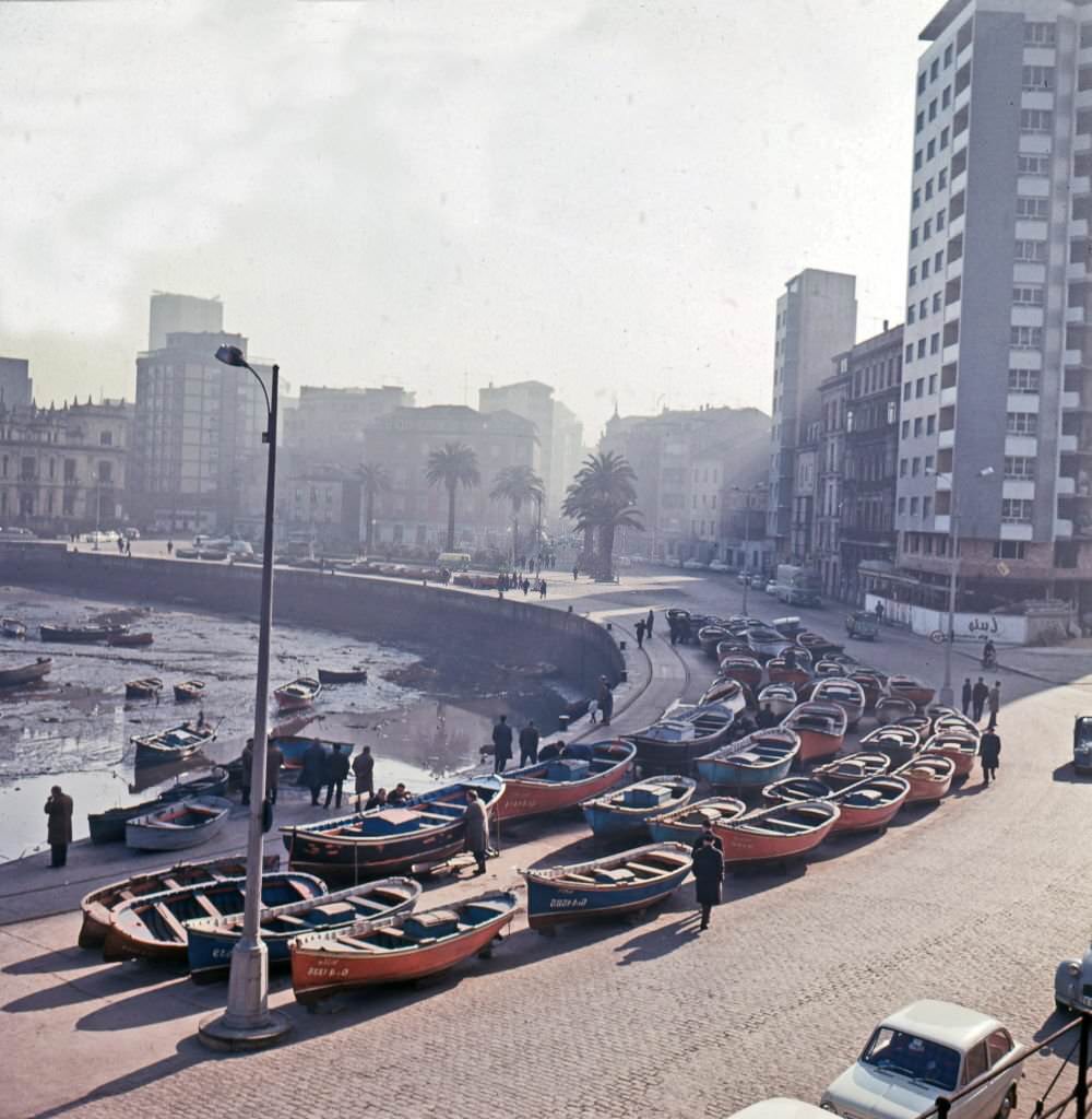 Number of boats in front of San Lorenzo beach in Gijon, Spain and surroundings, 1970.