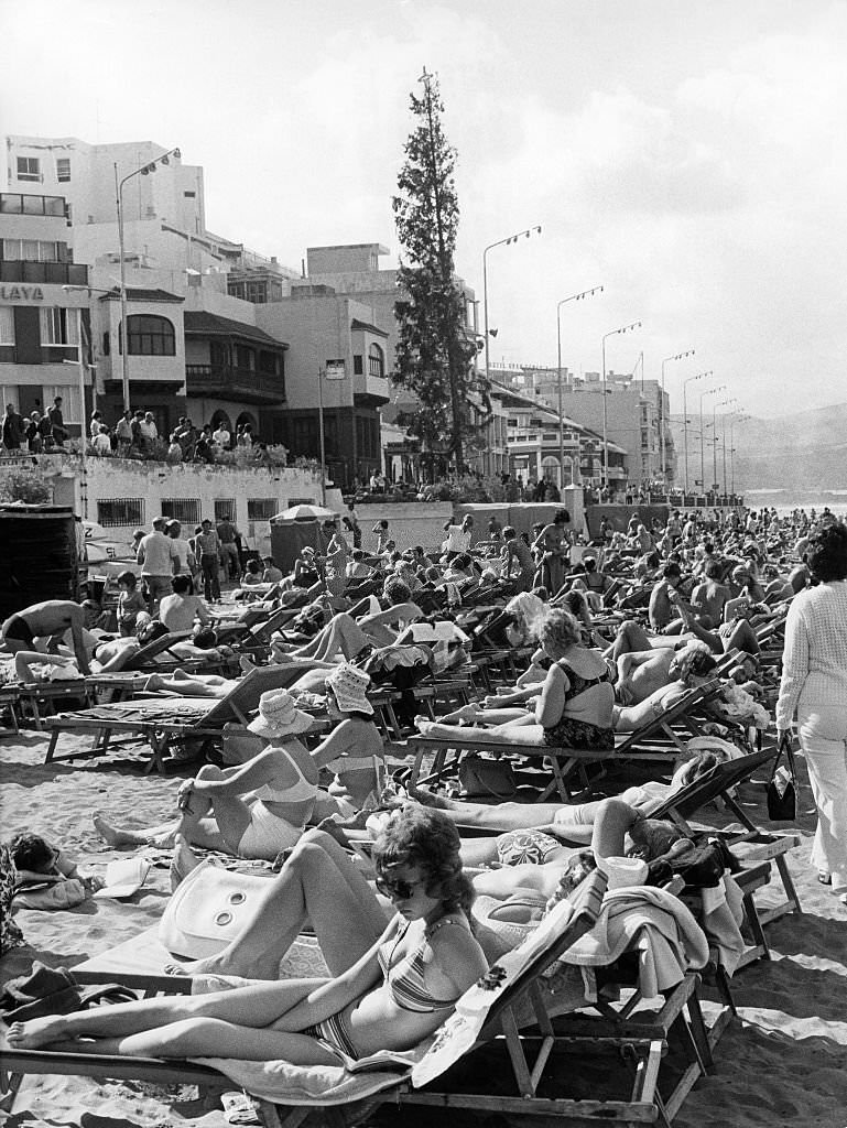 Tourists on the beach in the port city of Las Palmas, 1972