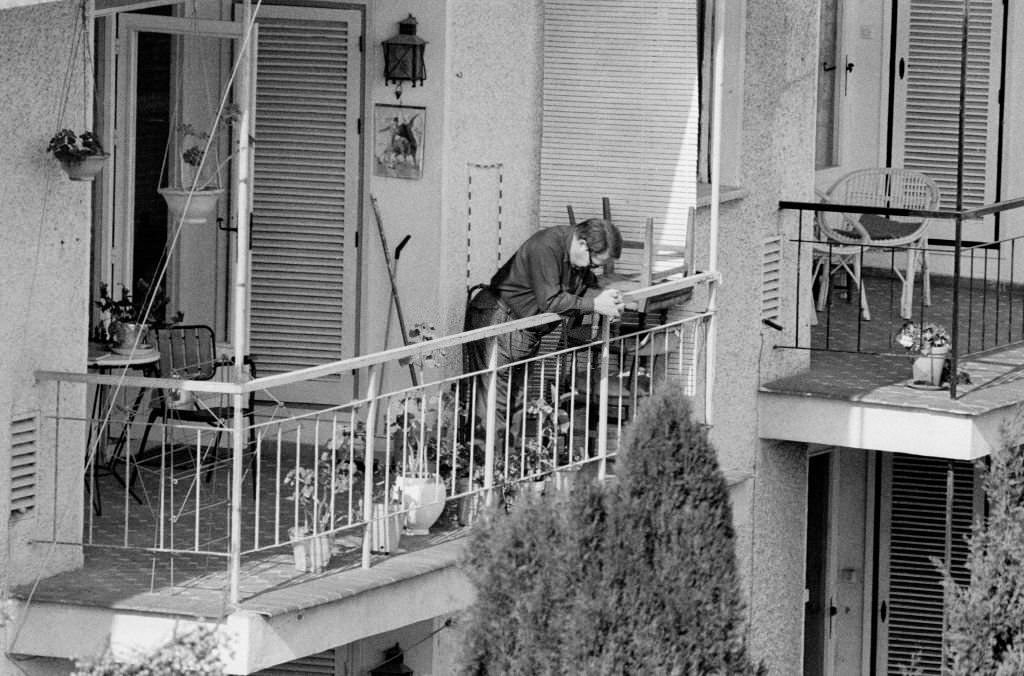 Lithuanian-born British industrialist Joseph Kagan as he leans on the balcony of a residential apartment, Fuengirola, Spain, 1980. At the time, he was a fugitive from British police on charges related to tax evasion.