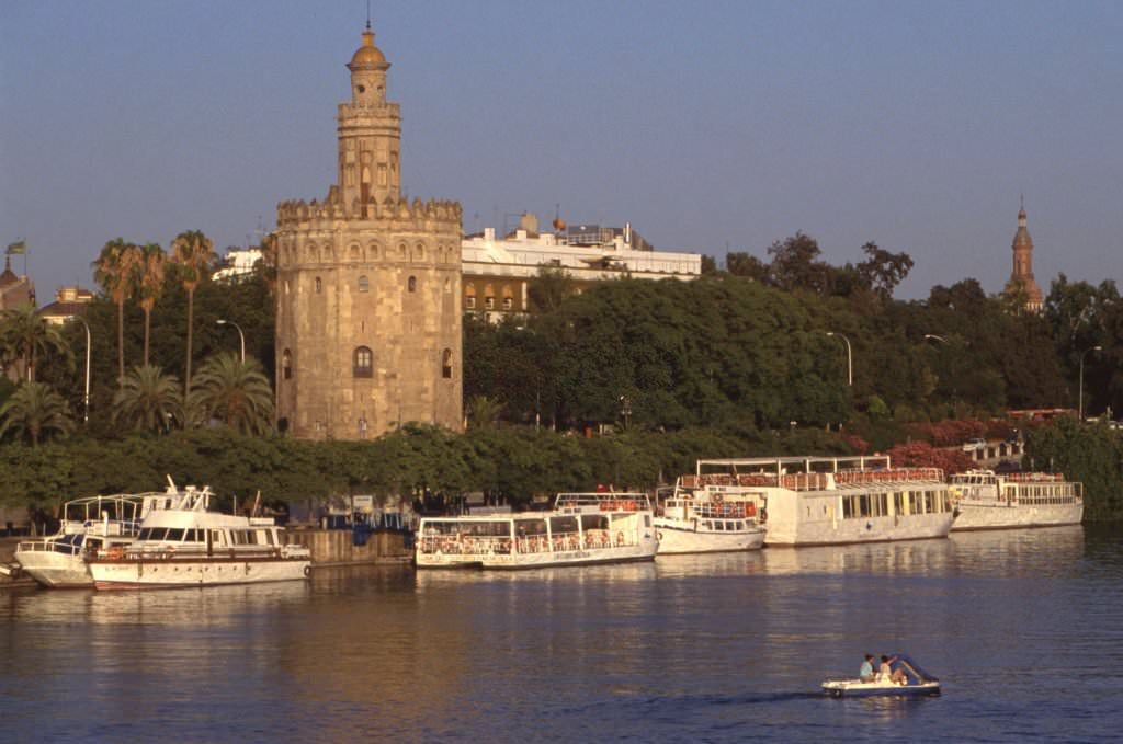 The Torre del Oro (Tower of Gold) on the banks of the Guadalquivir, in Seville, Andalusia, in May 1985, Spain.