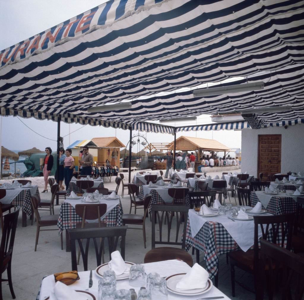 A restaurant at the beach La Carihuela of Torremolinos at the Costa del Sol, Andalusia, Spain 1980s.