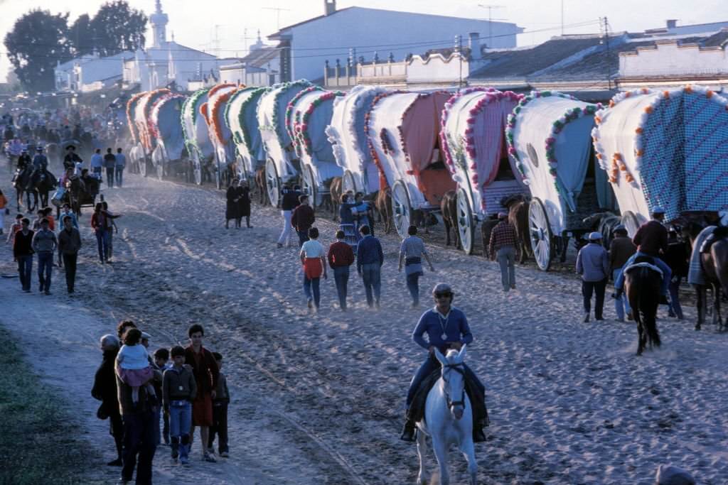 Procession of carts during the pilgrimage of El Rocío, in Almonte, in May 1983, in Andalusia, Spain.