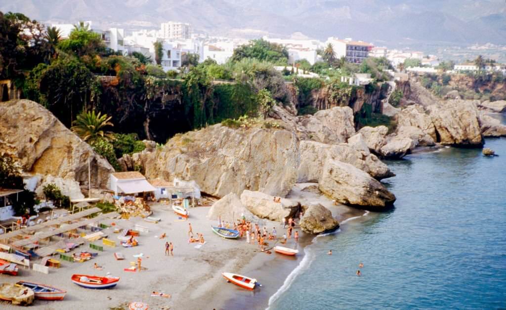 Elevated view of a beach, Nerja, Malaga, Andalusia, Spain, 1982.