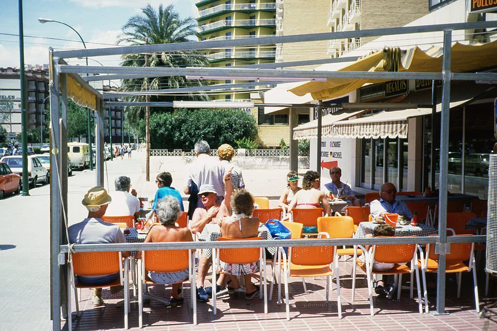 Tourists having lunch in Marbella, 1982, Malaga, Andalusia, Spain.