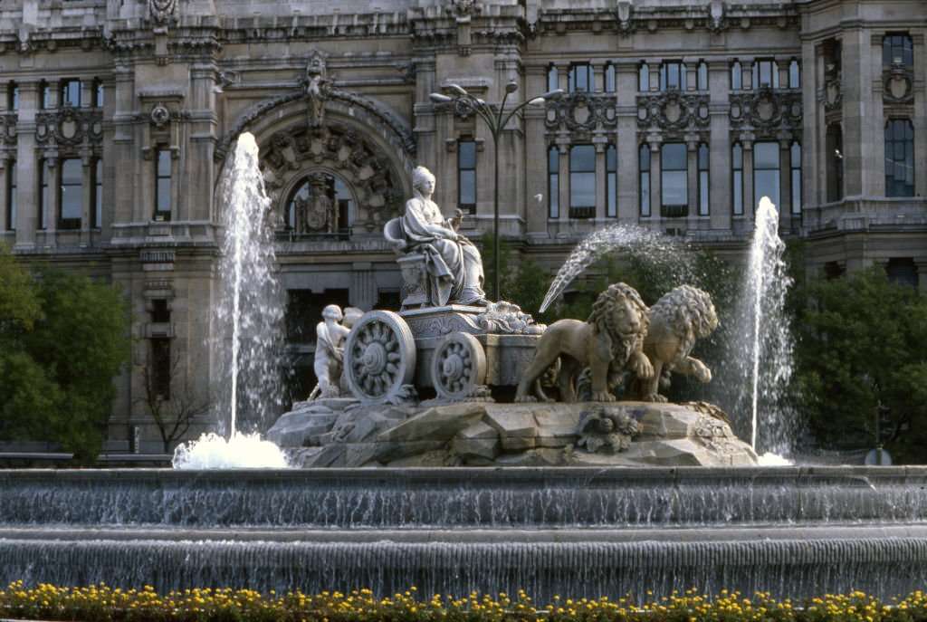 View of the fountain in Cybele square at night in Madrid, in October 1985, Spain.