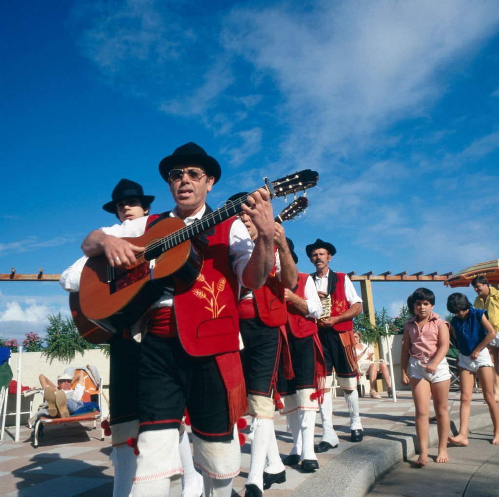 A folklore music group playing traditional tunes at Gran Canaria, Spain 1980s.
