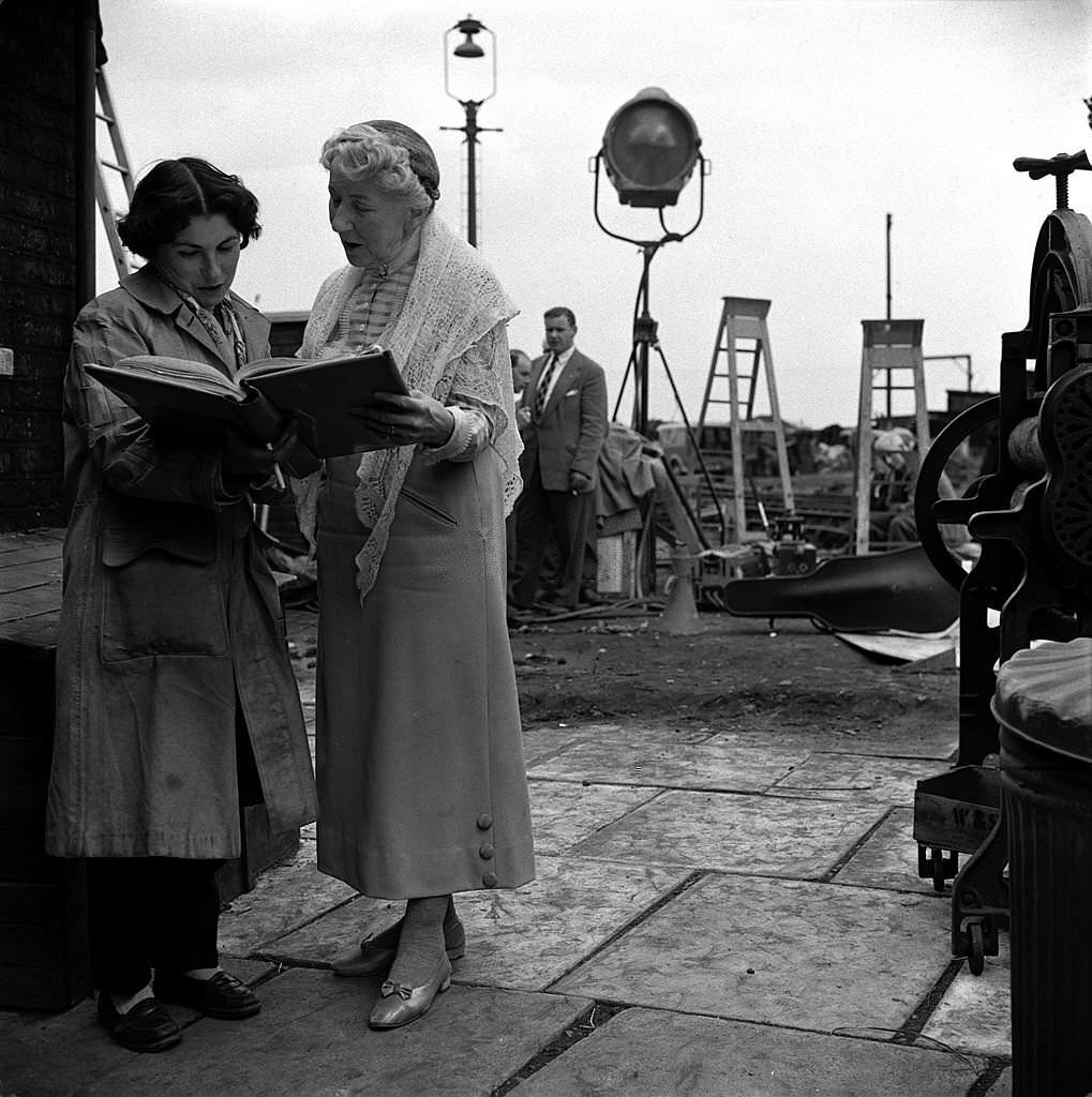 British actress Katie Johnson is pictured reading her lines on the set of the film 'The Ladykillers', 1955
