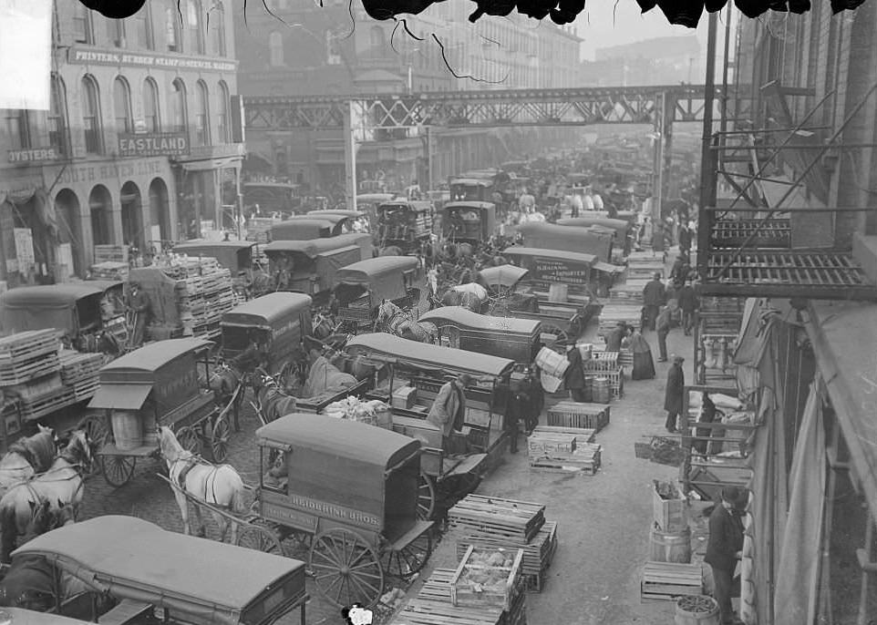 South Water Street Market looking west toward the elevated train tracks over Wells Street, Chicago, Illinois, 1904.