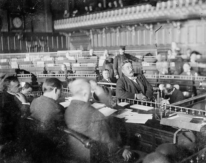 Mayor Carter H Harrison, looking up while testifying during the Iroquois Theater fire inquest, Chicago, Illinois, January 1904.