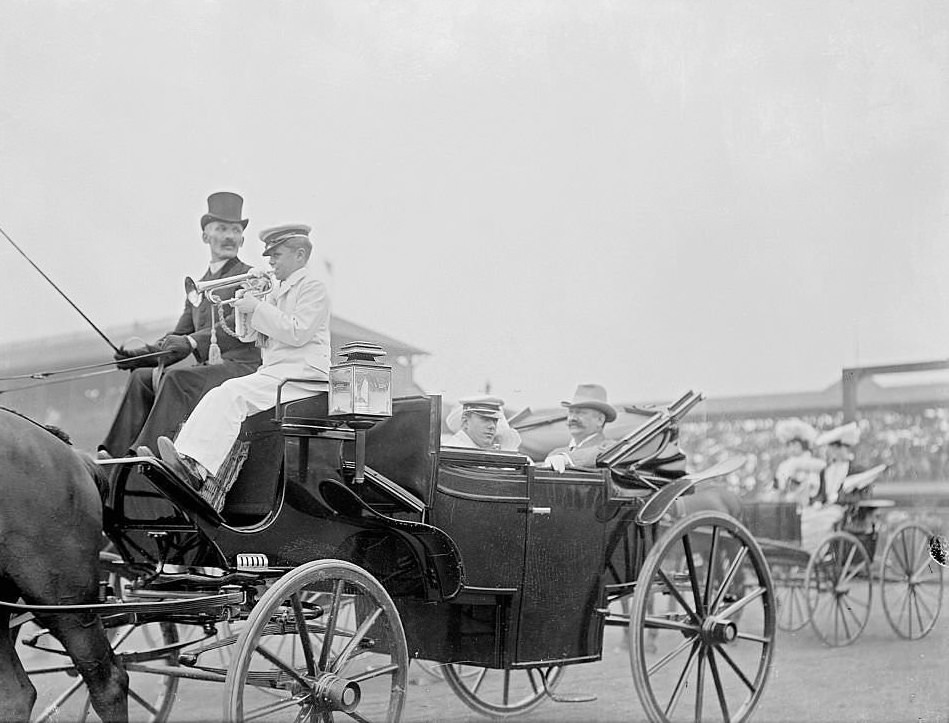 Men riding in a carriage, and two men sitting on the driver's bench, at the Washington Park Race Track on Derby Day, Chicago, Illinois, 1903.