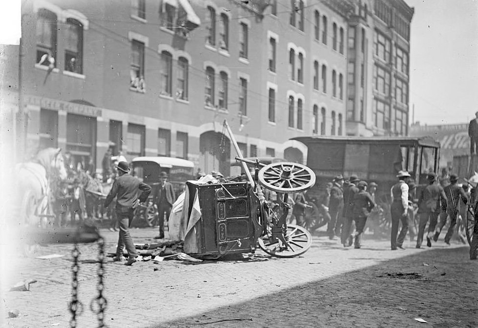 Cart overturned during a teamsters strike, June 4, 1902.