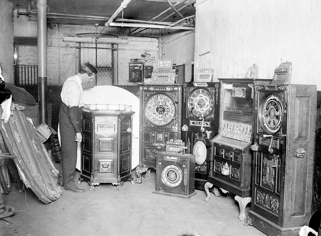 A store of confiscated illegal slot machines in a storage area in Chicago, Illinois, 1906.