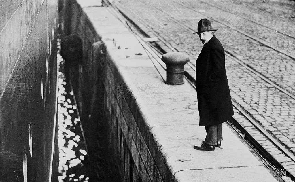 Albert Einstein, caught by the camera on the quay just before he boarded the S.S. Belgenland, which is bringing him to the United States, where he will go to make scientific observations in California.