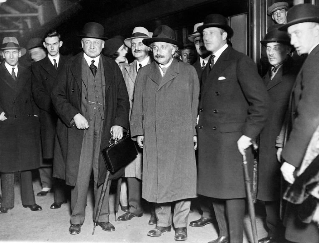 Albert Einstein upon his arrival at Victoria Station in London before attending a banquet where he will be guest of honour, 27th October 1930.