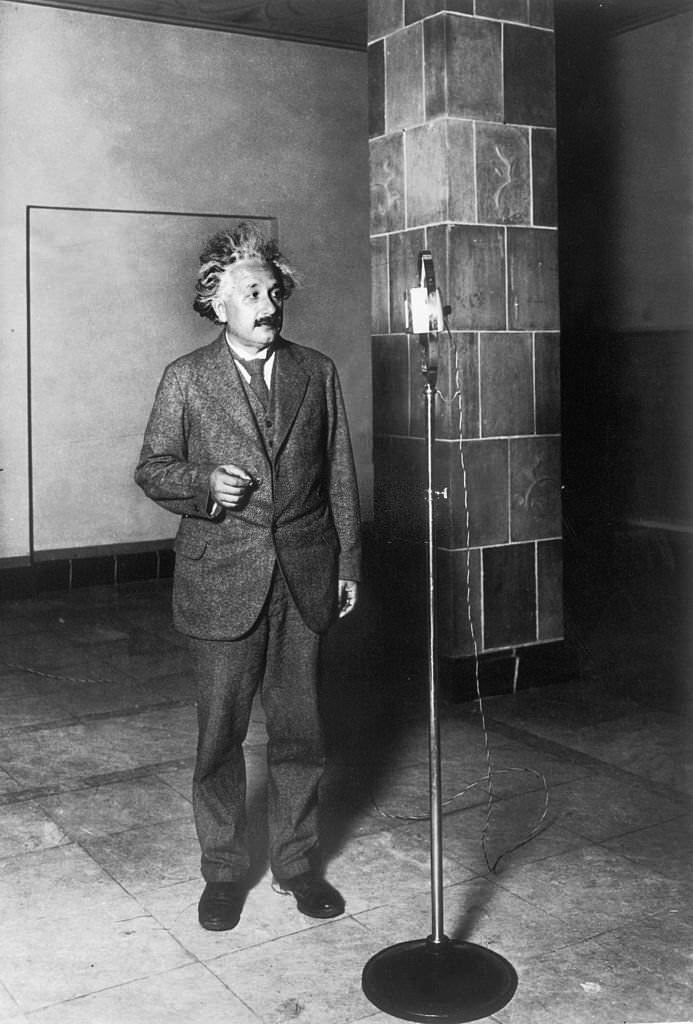 Albert Einstein giving a speech. Tat the Wireless Telegraphy for the 50th anniversary of the invention of the electric lamp.