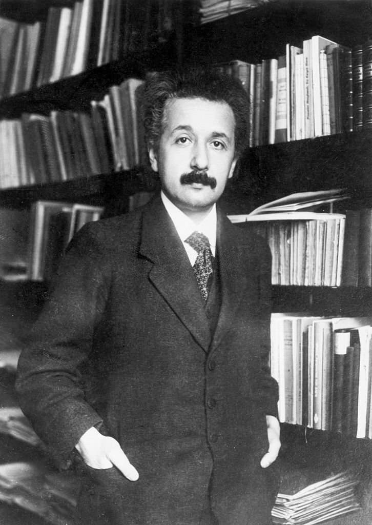 Albert Einstein in his Library