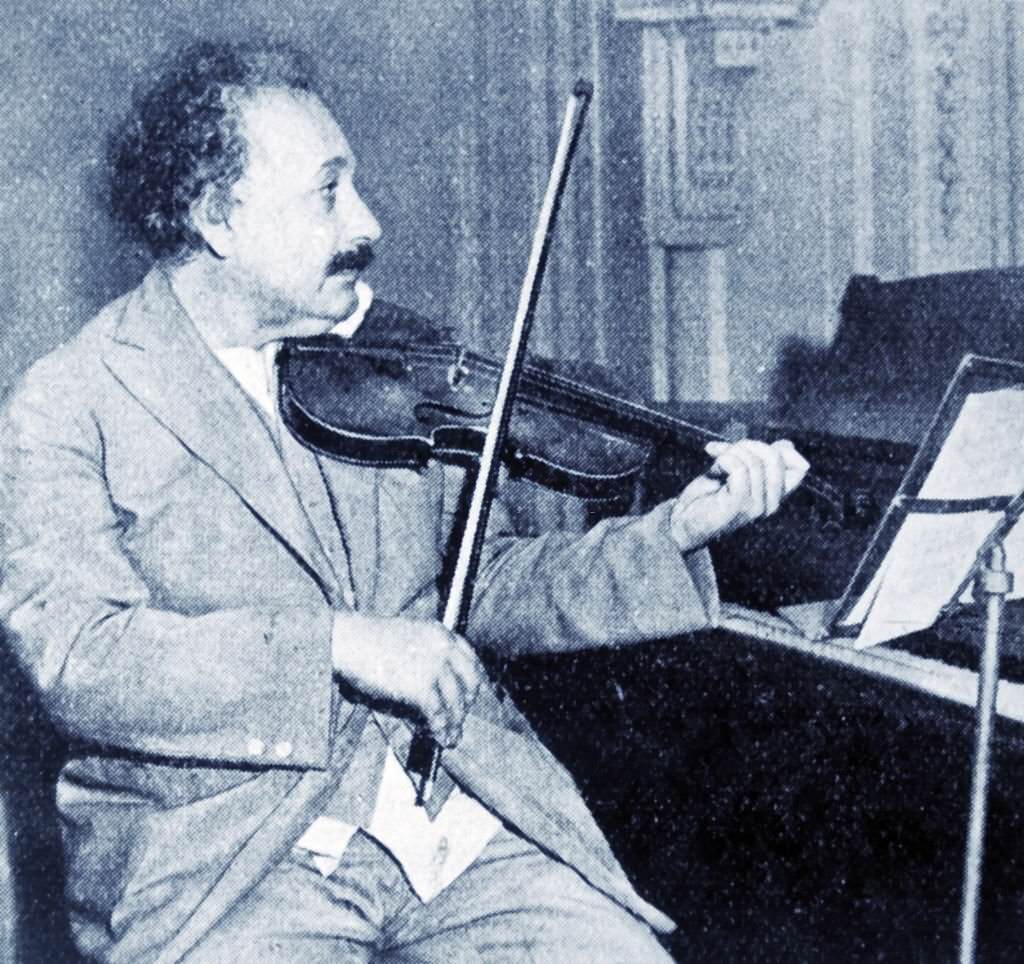 Professor Albert Einstein playing his violin.