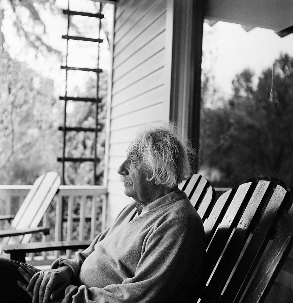 Albert Einstein outside his home in Princeton, New Jersey, where he is professor at the Institute for Advanced Studies, 1951.