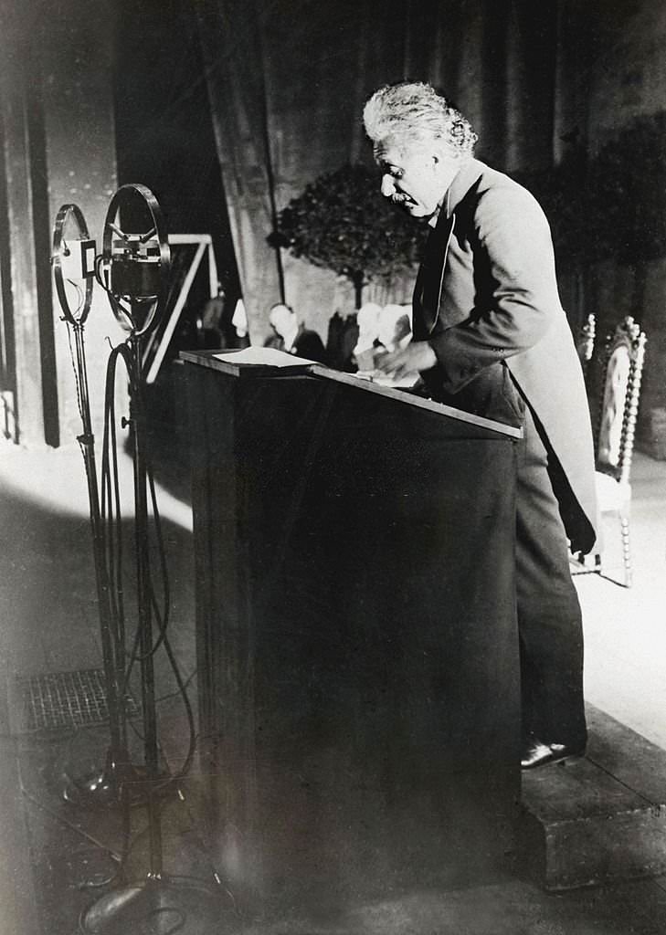 Albert Einstein giving a lecture at the 1930 Solvay Congress in Brussels