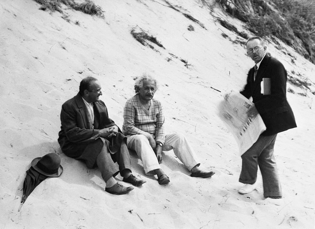 Albert Einstein with Hans Meyer on the sand dunes at Coq-Sur-Mer, Belgium, where the world renowned scientist took refuge from Nazi threats.