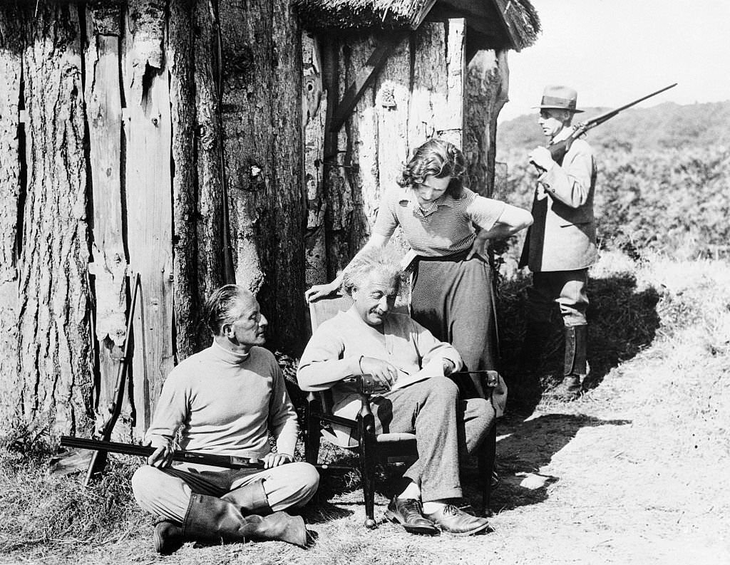 Albert Einstein with His Secretary and Oliver L. Lampson