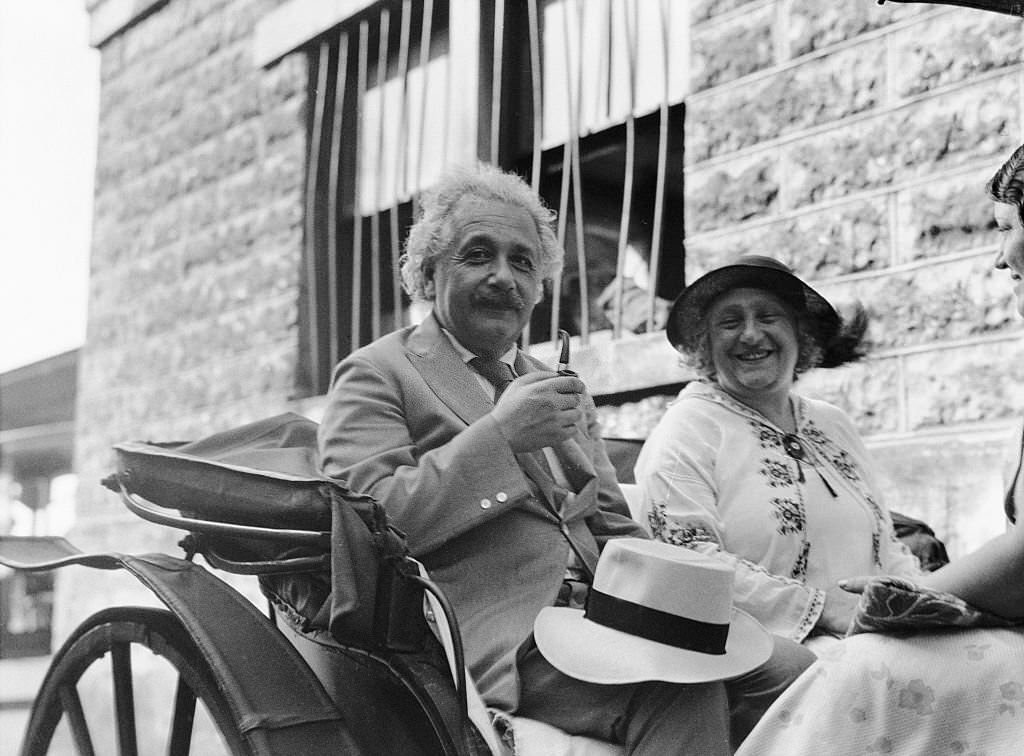 Albert Einstein and Wife Riding in Carriage