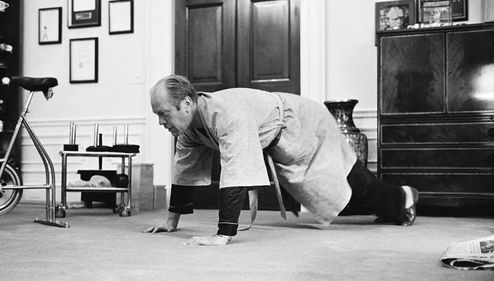 Gerald Ford does push-ups in the White House, 1975.