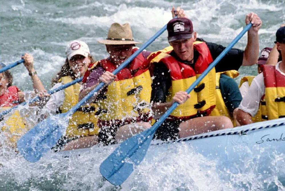 Bill Clinton enjoys some whitewater rafting on the Snake River in Wyoming, 1995.