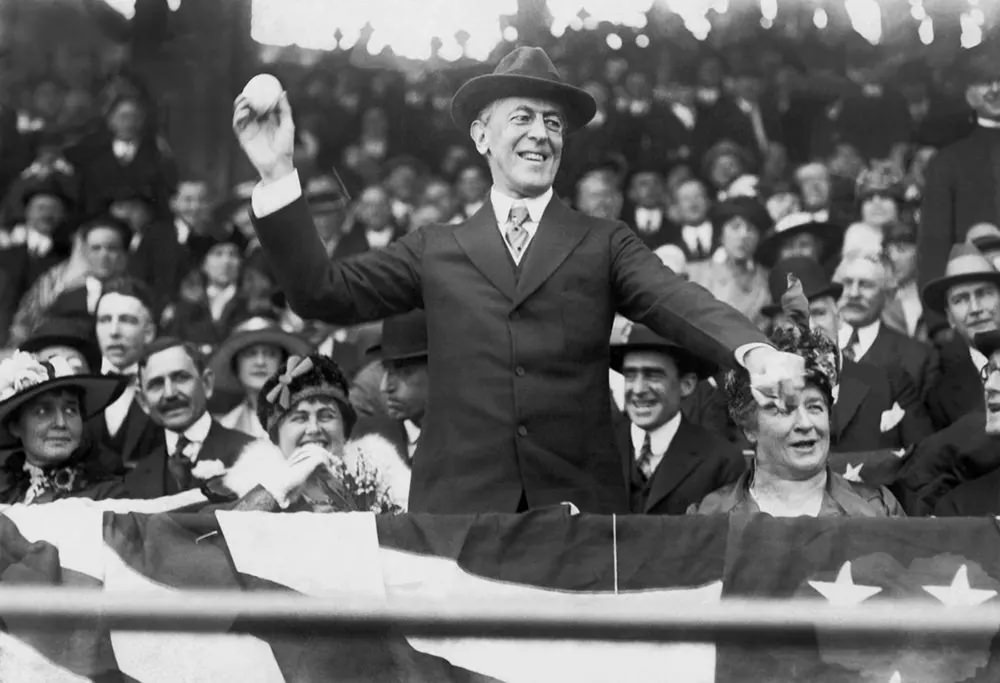 Woodrow Wilson throws out the first ball of the baseball season in Washington, D.C., 1916.