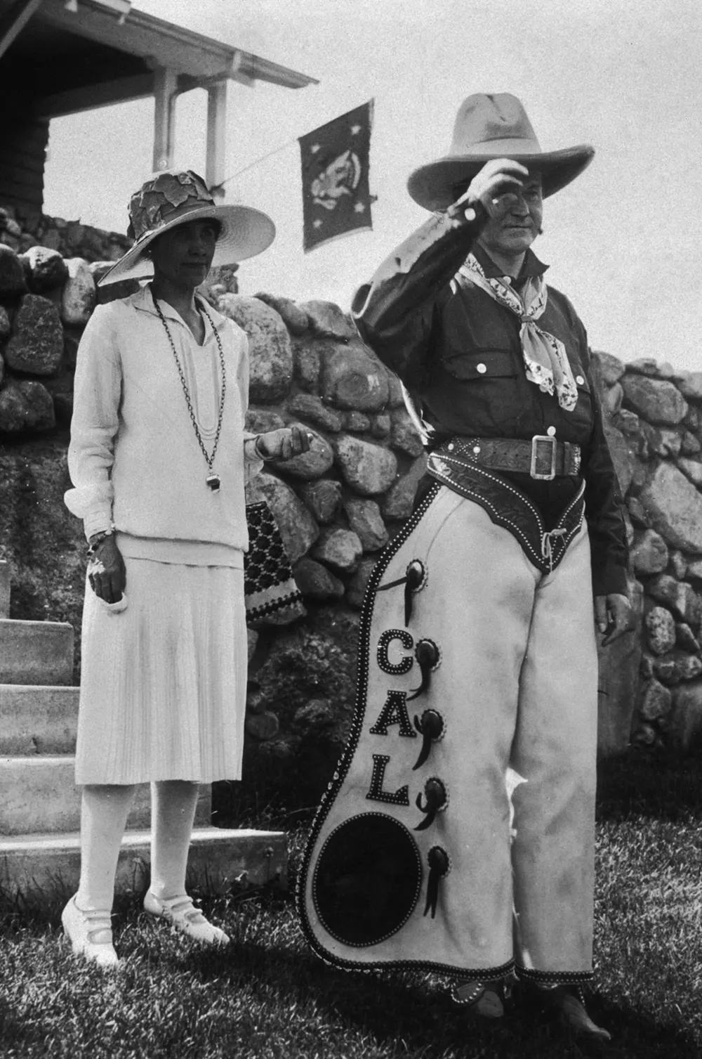Calvin Coolidge celebrates the 4th of July and his 55th birthday with his wife Grace at a Game Lodge in South Dakota, 1927.