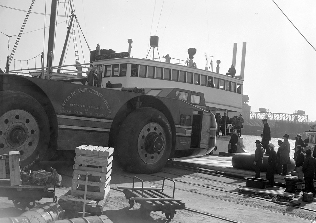 The Snow Cruiser rolls onto the North Star at high tide.