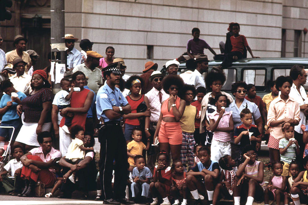 Members of Chicago’s South Side community line a portion of Dr. Martin L. King Jr. Drive to watch the Bud Billiken Day Parade, August 1973.