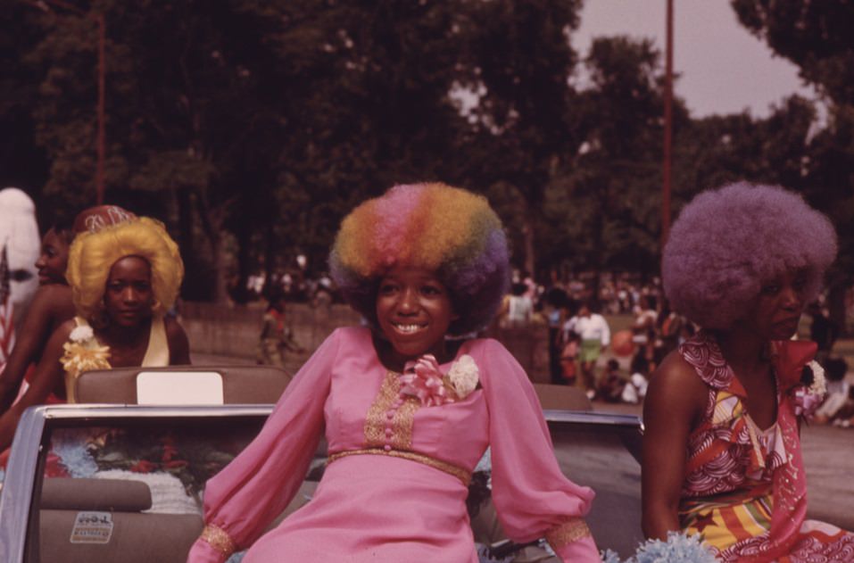Beauties with colorful hair grace a float during the annual Bud Billiken Day Parade along Dr. Martin l. King Jr. drive in Chicago’s South Side.