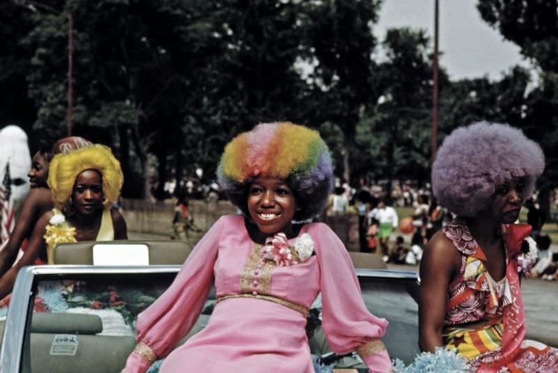 Women in wigs at the Bud Billiken Parade.
