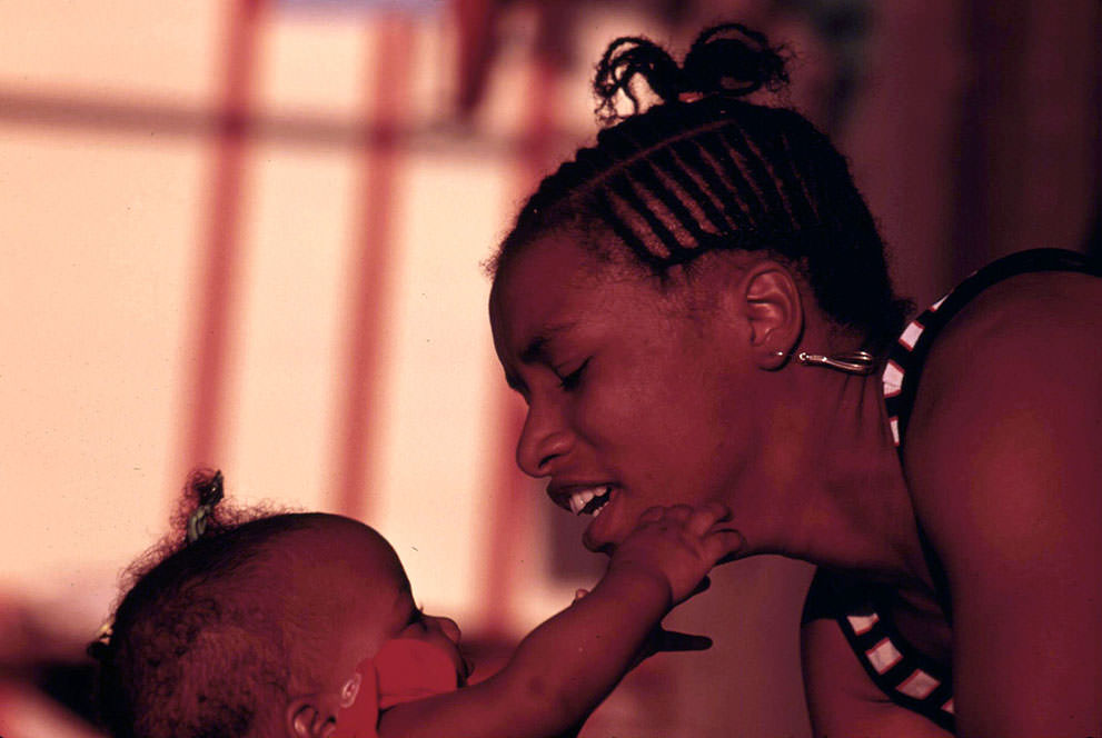 Mother and child, during an outing at Chicago’s 12th Street Beach on Lake Michigan, August 1973.