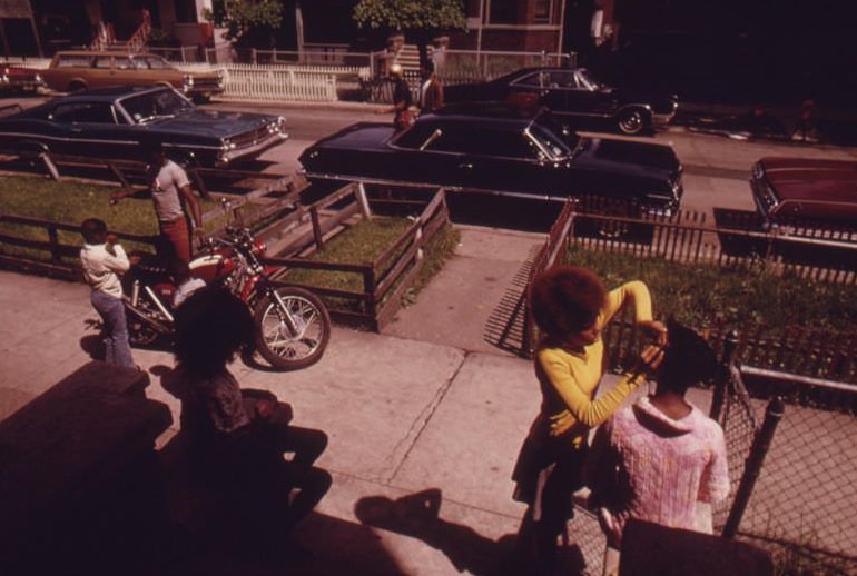 Black neighbors outside on Chicago’s West Side. They are part of the nearly 1.2 million people of their race who make up more than one-third of Chicago’s population.