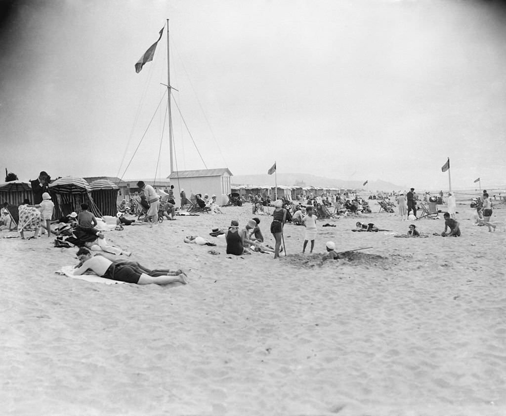 The beach of Deauville in 1927 in Deauville, France.