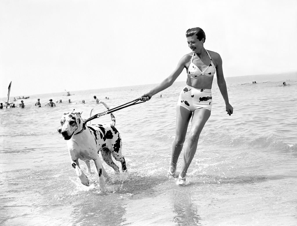 Countess De Bremond D Ars with her dogs at Deauville Beach, 1938