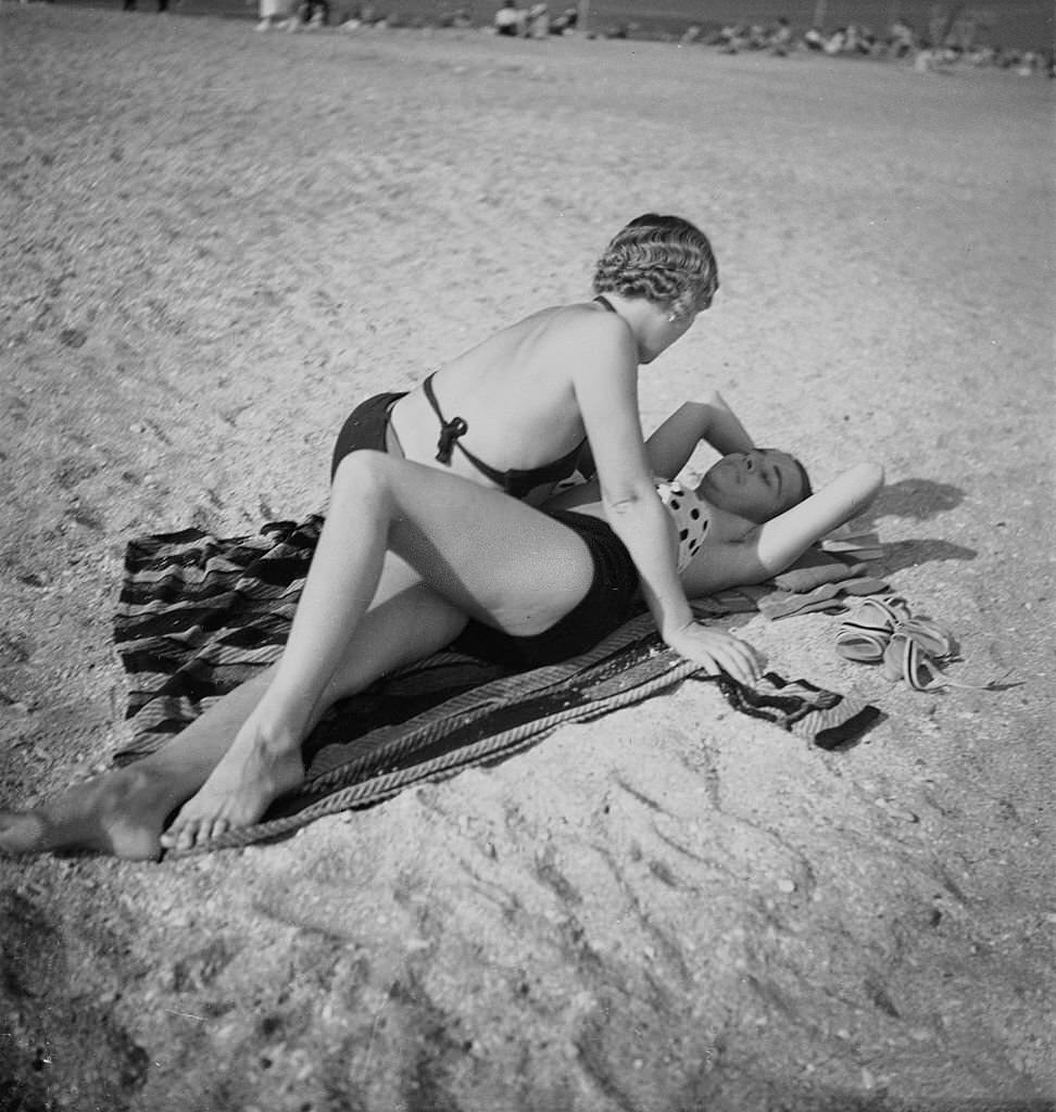 Women on the beach of Deauville, 1936