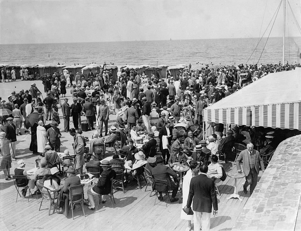 Masses of people at the beach of Deauville, 1930