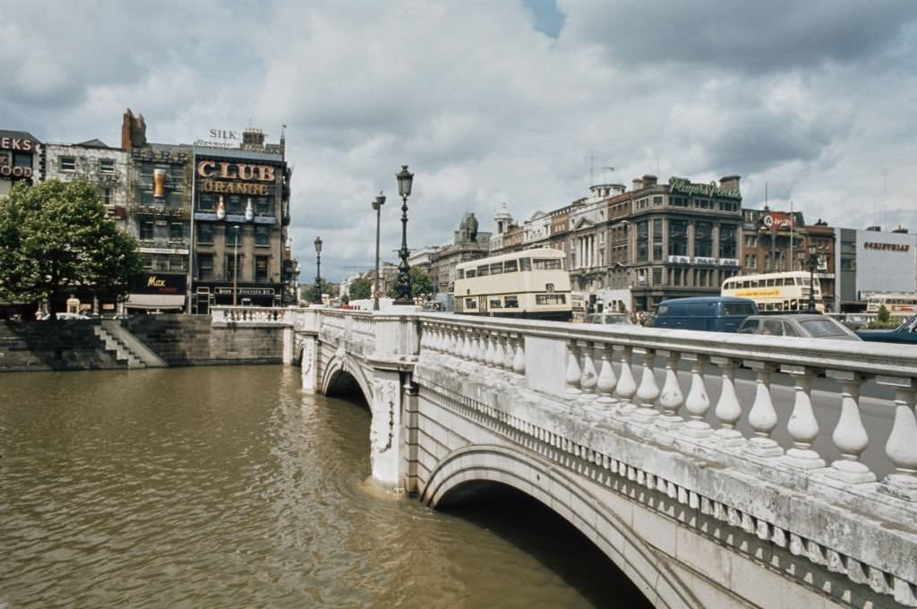 View of O'Connell St with bridge and river Liffey in foreground, Dublin, 1970s